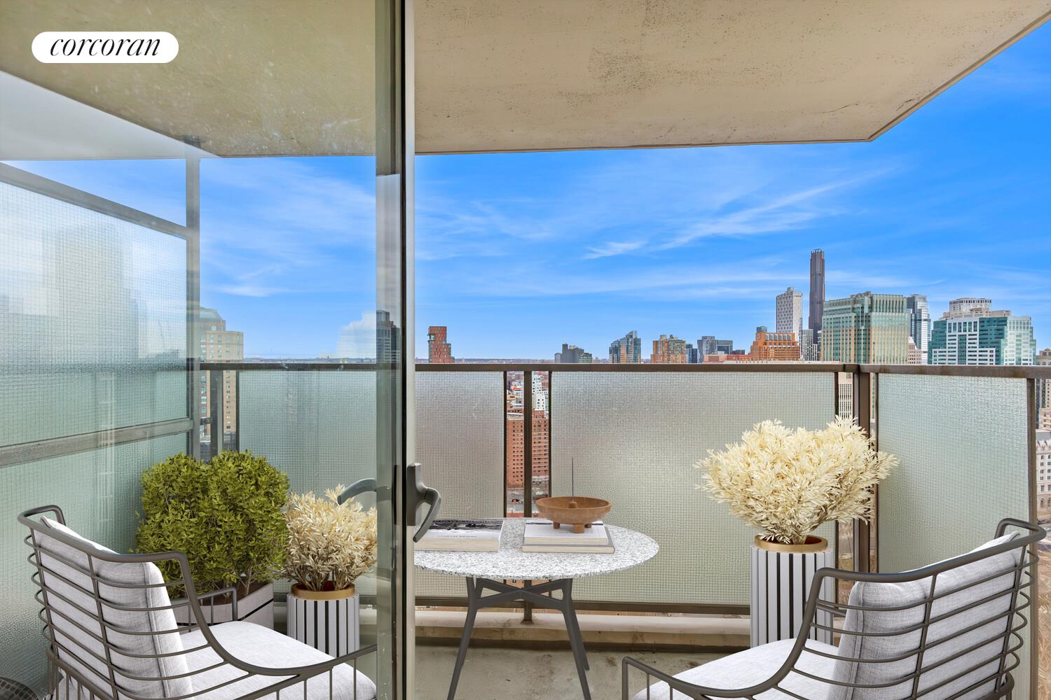 75 Henry Street, Unit 29H Brooklyn, NY 11201 - Photo 9 of 20 a view of a balcony dining table and chairs