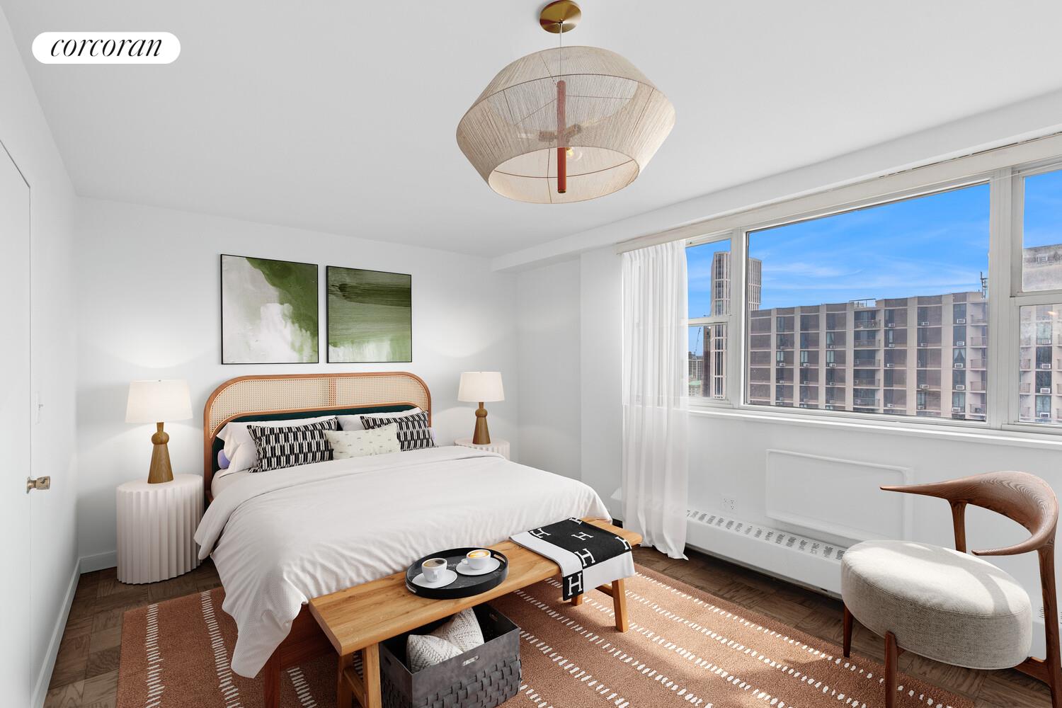 75 Henry Street, Unit 29H Brooklyn, NY 11201 - Photo 12 of 20 a bedroom with a bed and a chandelier