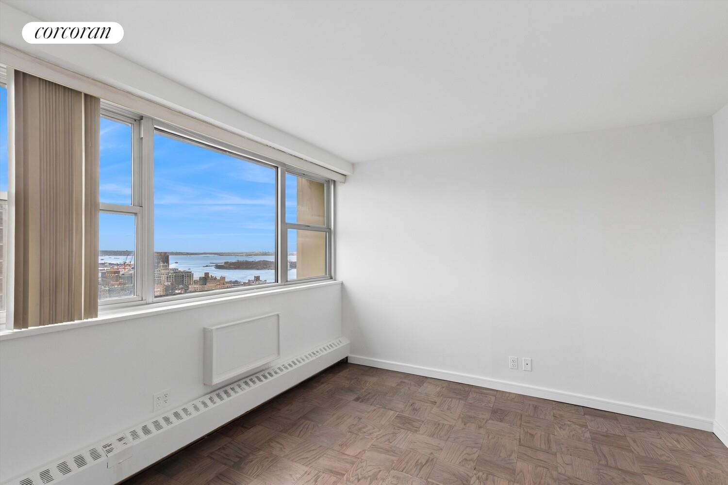 75 Henry Street, Unit 29H Brooklyn, NY 11201 - Photo 13 of 20 a view of an empty room and window