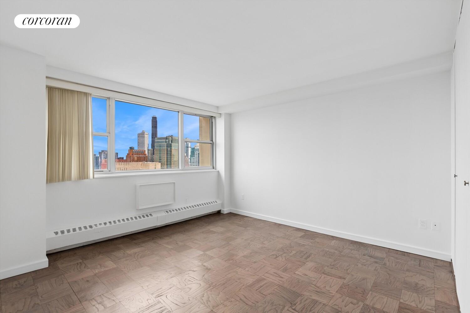 75 Henry Street, Unit 29H Brooklyn, NY 11201 - Photo 15 of 20 a view of an empty room with a window