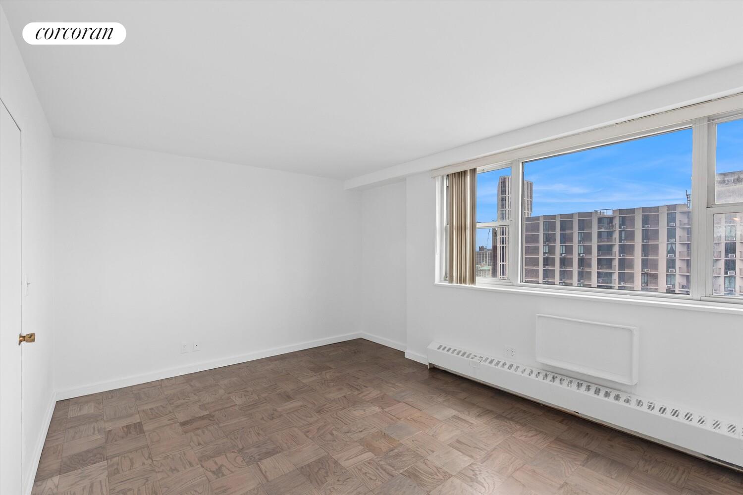 75 Henry Street, Unit 29H Brooklyn, NY 11201 - Photo 18 of 20 a view of an empty room with a window