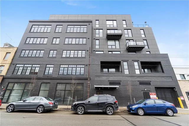 a car parked in front of a building