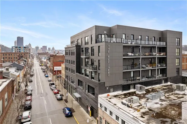 a view of a city with tall buildings