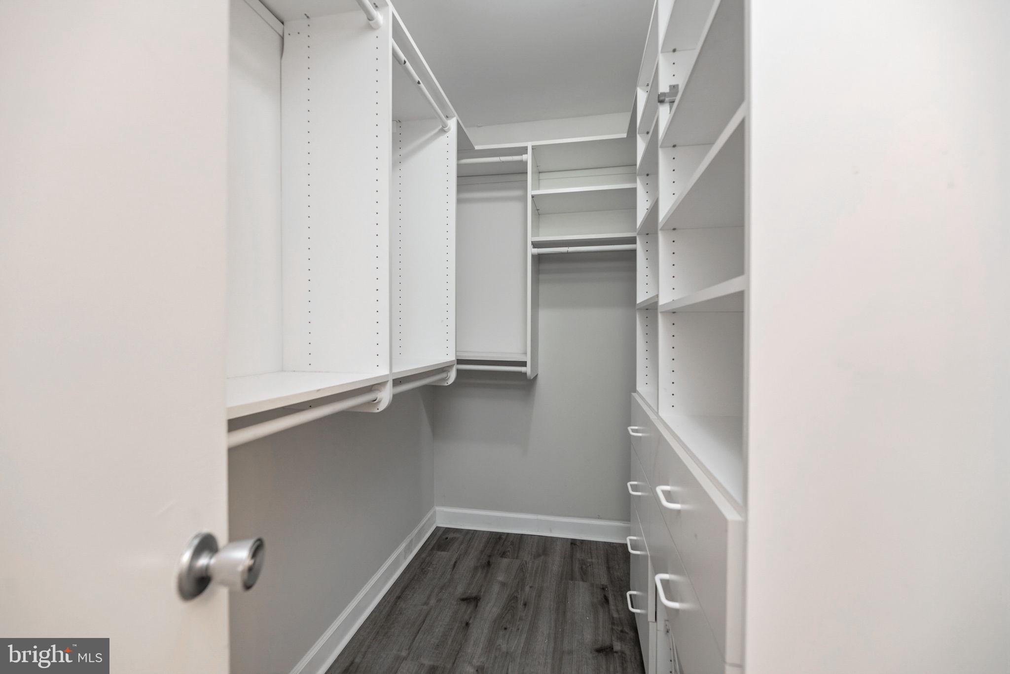1443 Northgate Square, Unit 22B Reston, VA 20190 - Photo 20 of 42 a view of an empty walk in closet