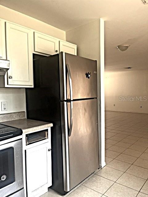 12 Pine Course Way Ocala, FL 34472 - Photo 15 of 29 a kitchen with metallic refrigerator freezer and a dishwasher