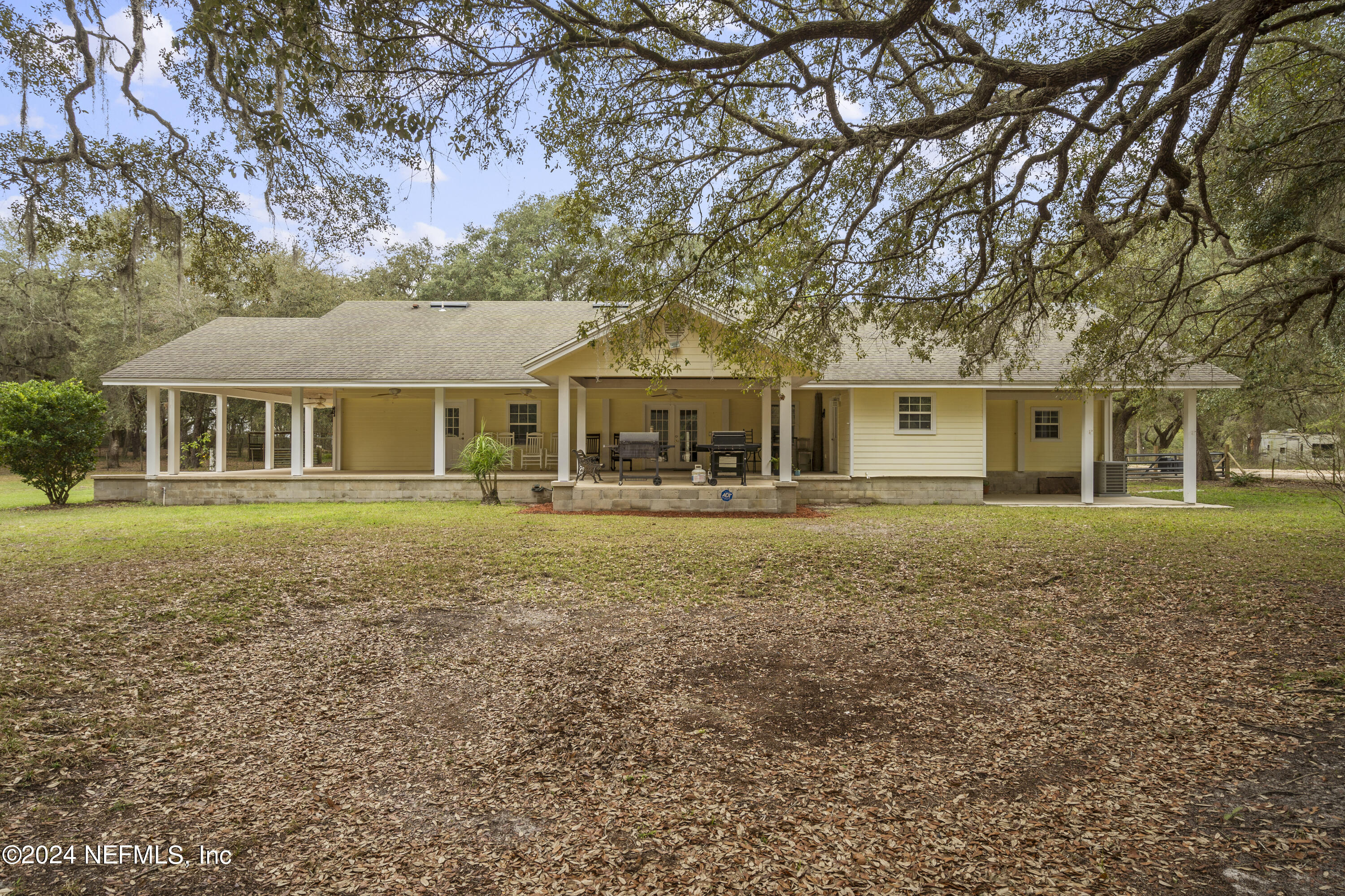 101 Tiffany Road Melrose, FL 32666 - Photo 1 of 51 front view of a house with a yard