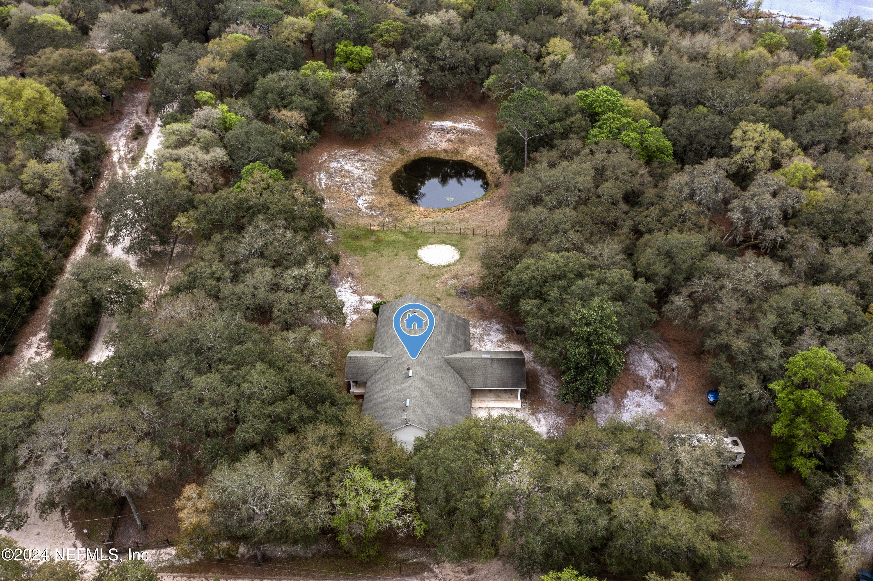 101 Tiffany Road Melrose, FL 32666 - Photo 45 of 51 an aerial view of a house with a yard and tree s