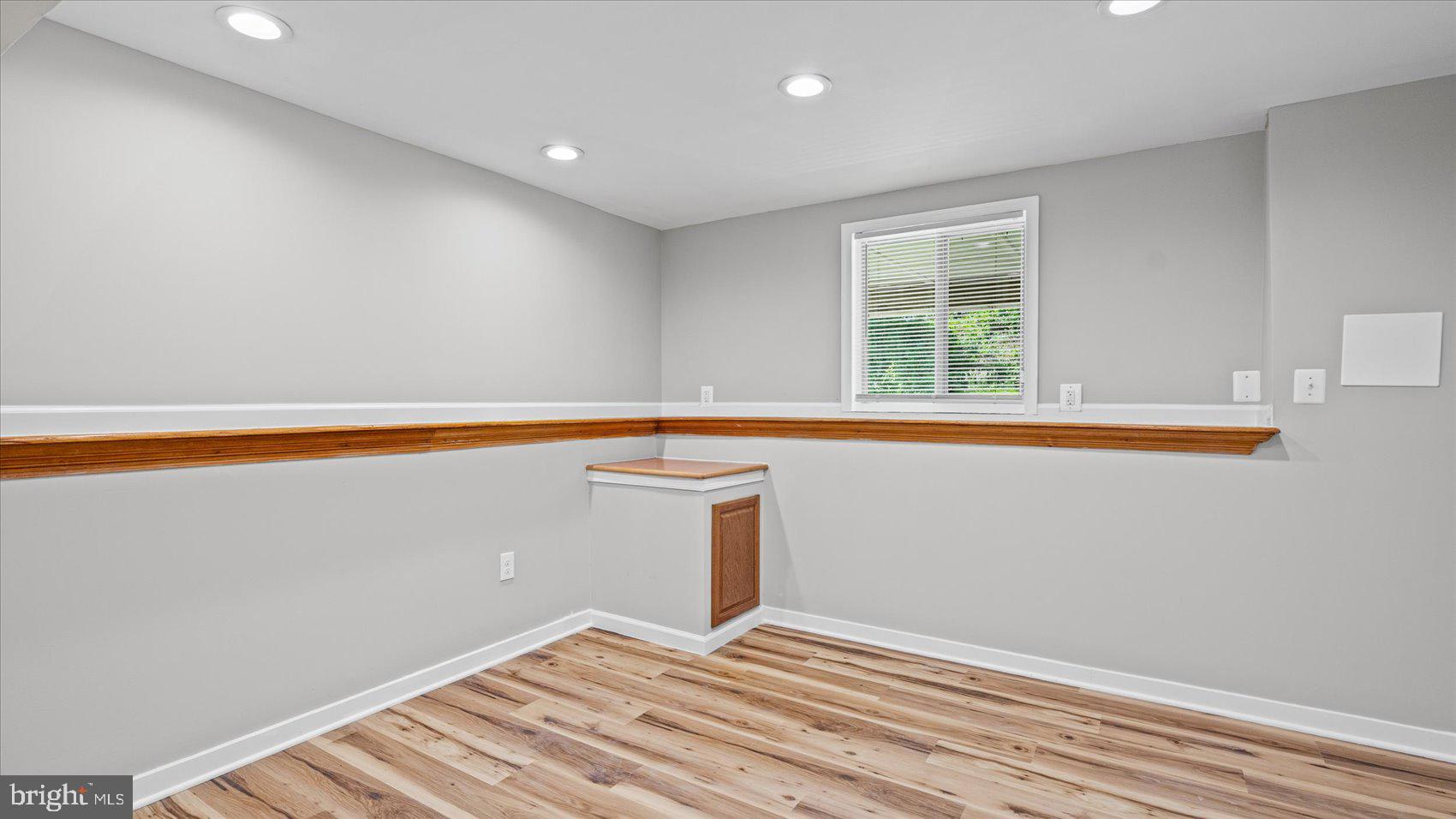 3709 Redberry Way Nottingham, MD 21236 - Photo 34 of 45 a view of a room with wooden floor and window