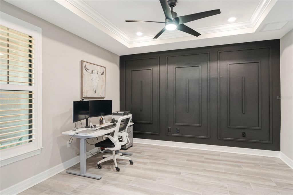 13303 Rinella Street Venice, FL 34293 - Photo 11 of 52 a work room with a window and furniture