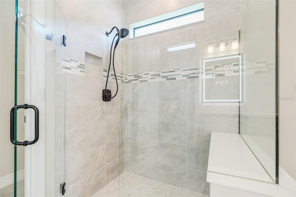 13303 Rinella Street Venice, FL 34293 - Photo 24 of 52 a bathroom with a shower