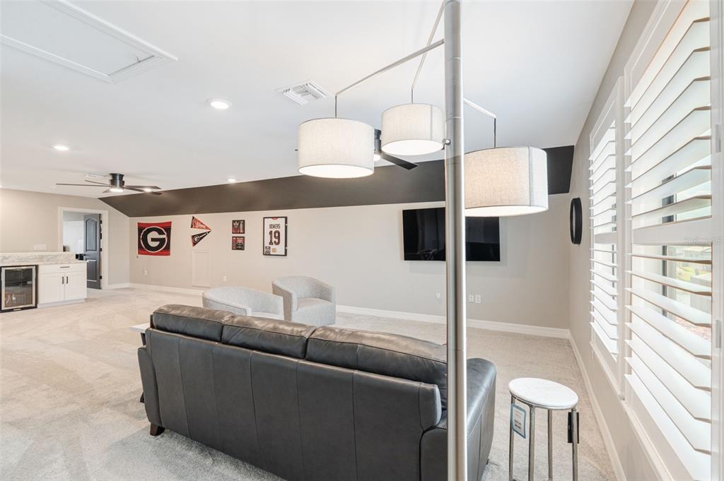 13303 Rinella Street Venice, FL 34293 - Photo 31 of 52 a living room with furniture