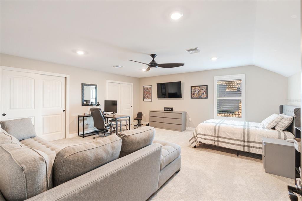 13303 Rinella Street Venice, FL 34293 - Photo 33 of 52 a living room with furniture and white walls