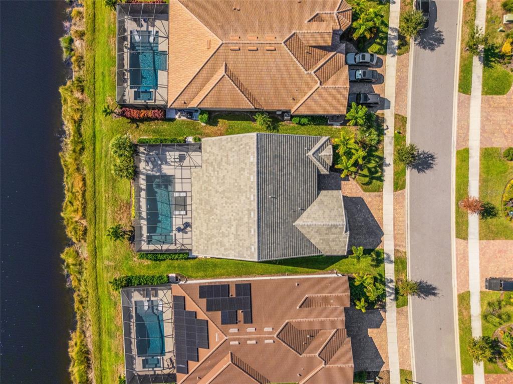 13303 Rinella Street Venice, FL 34293 - Photo 45 of 52 front view of a house with a street
