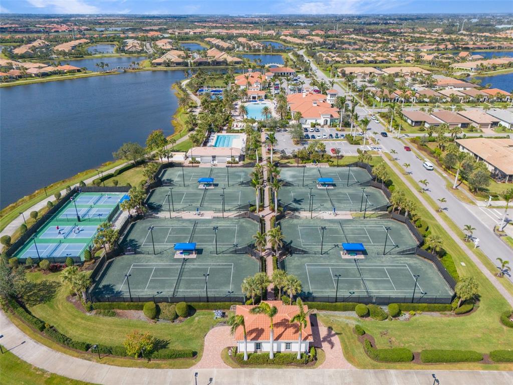 13303 Rinella Street Venice, FL 34293 - Photo 50 of 52 an aerial view of a house with a swimming pool