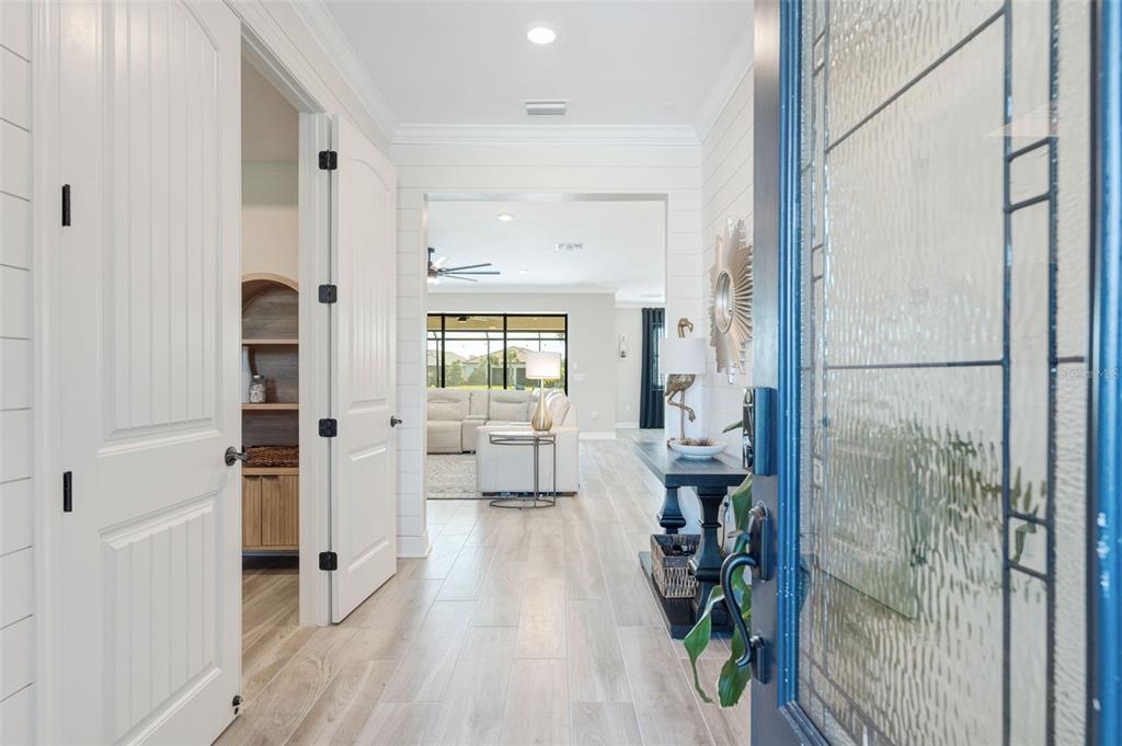 13303 Rinella Street Venice, FL 34293 - Photo 5 of 52 a living room with furniture and a fireplace
