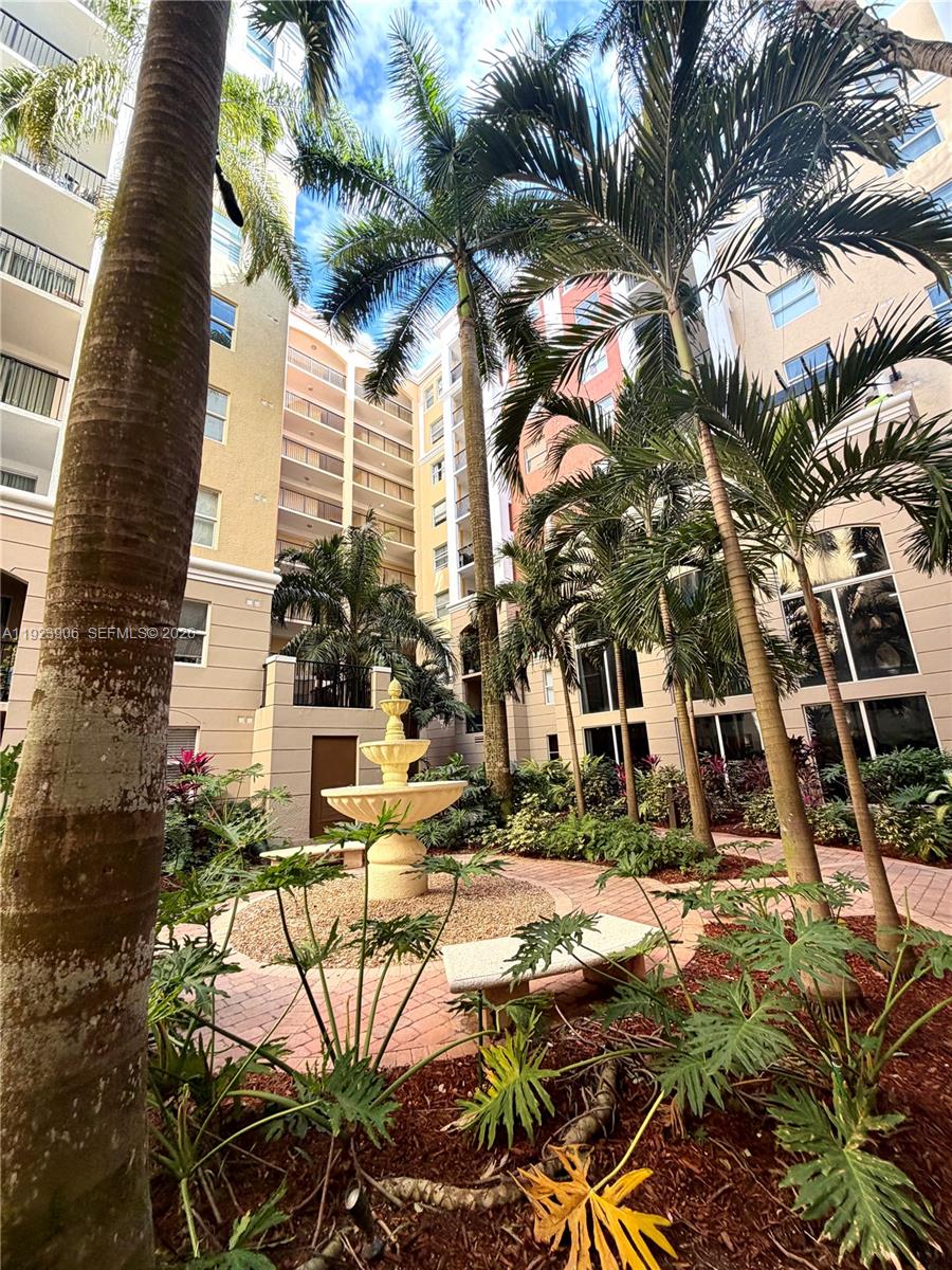 17150 North Bay Road, Unit 2419 Sunny Isles Beach, FL 33160 - Photo 18 of 27 a view of multiple houses with yard