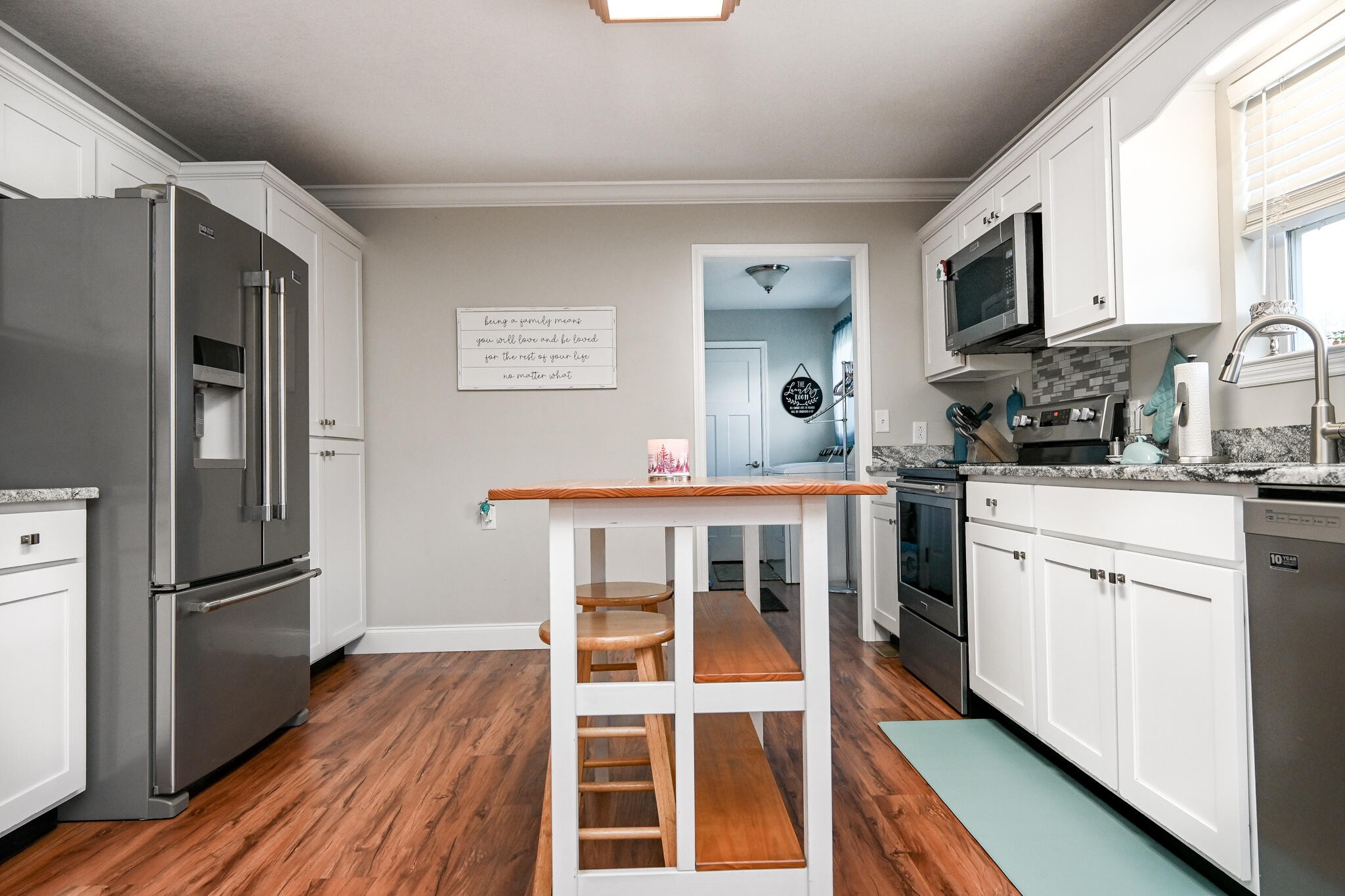 276 Mason Road McDonald, TN 37353 - Photo 21 of 67 a kitchen with stainless steel appliances granite countertop a refrigerator stove top oven and sink