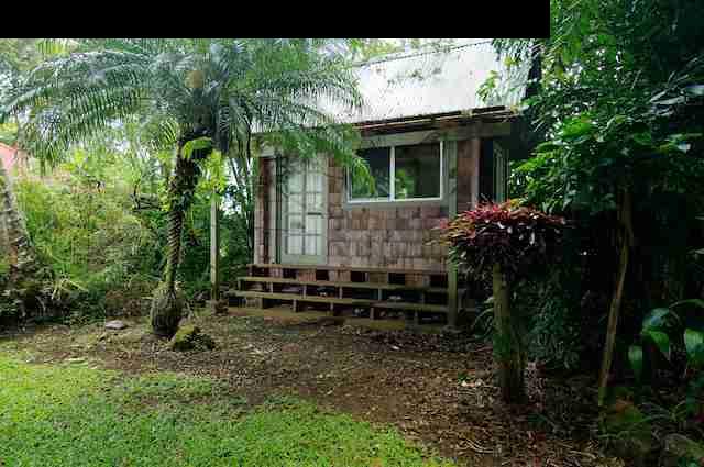 490 Kaupakalua Road Haiku, HI 96708 - Photo 23 of 30 a view of house with backyard and outdoor seating