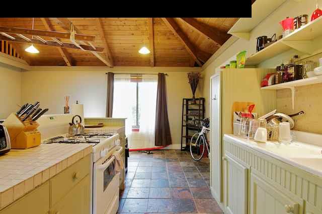 490 Kaupakalua Road Haiku, HI 96708 - Photo 7 of 30 a kitchen with a sink and cabinets