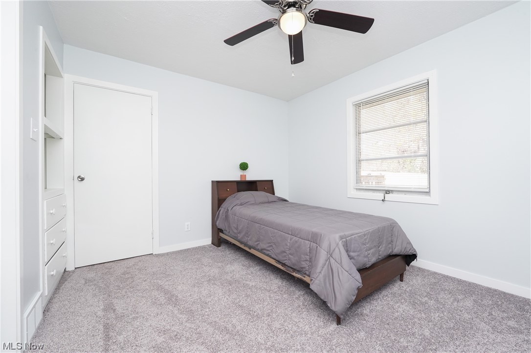601 Shook Road Akron, OH 44319 - Photo 20 of 35 Bedroom with ceiling fan and light carpet