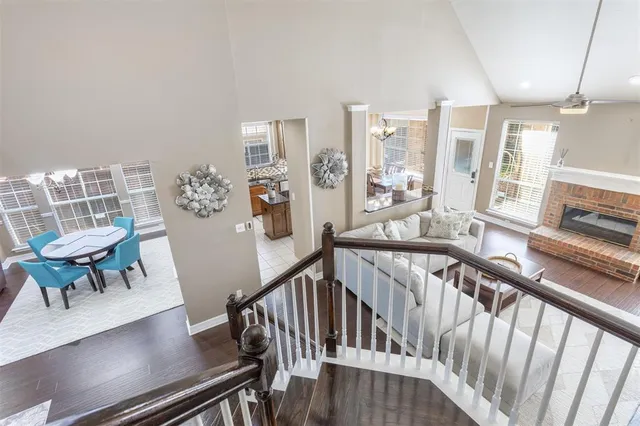 a view of a chairs and table in a balcony