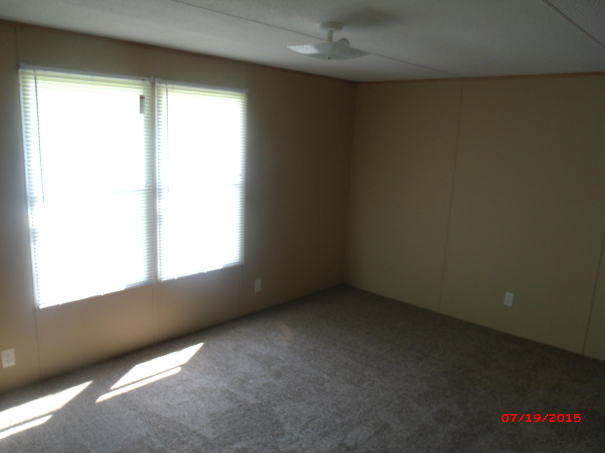 5469 Callands Road Chatham, VA 24531 - Photo 11 of 12 an empty room with a window