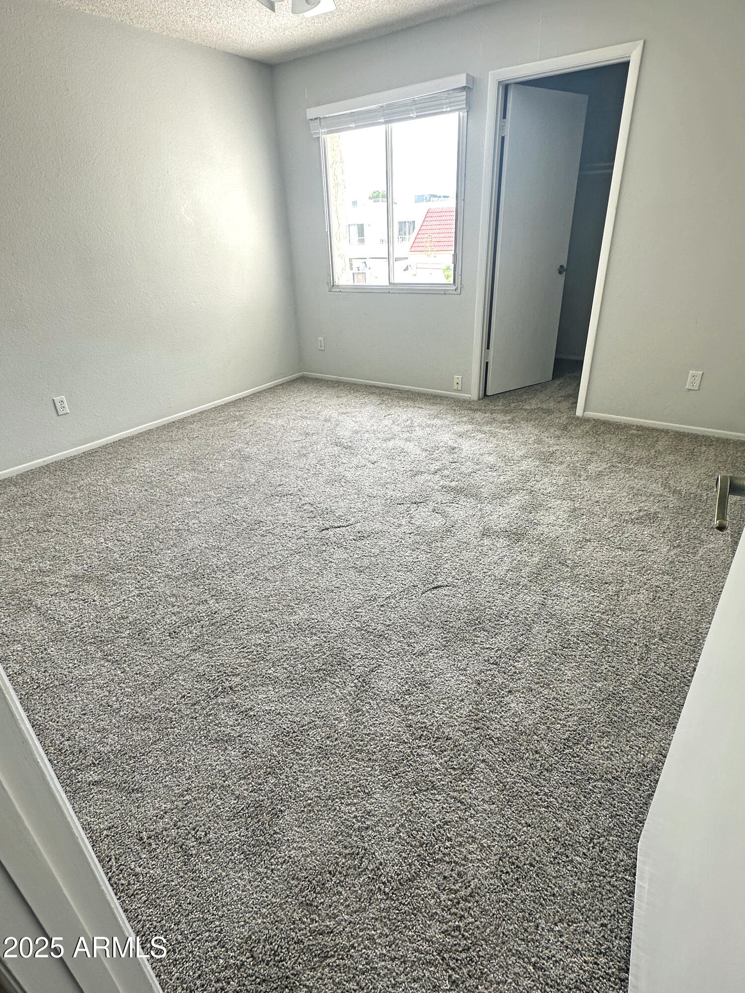 6018 North 79th Street Scottsdale, AZ 85250 - Photo 12 of 24 a view of an empty room and window