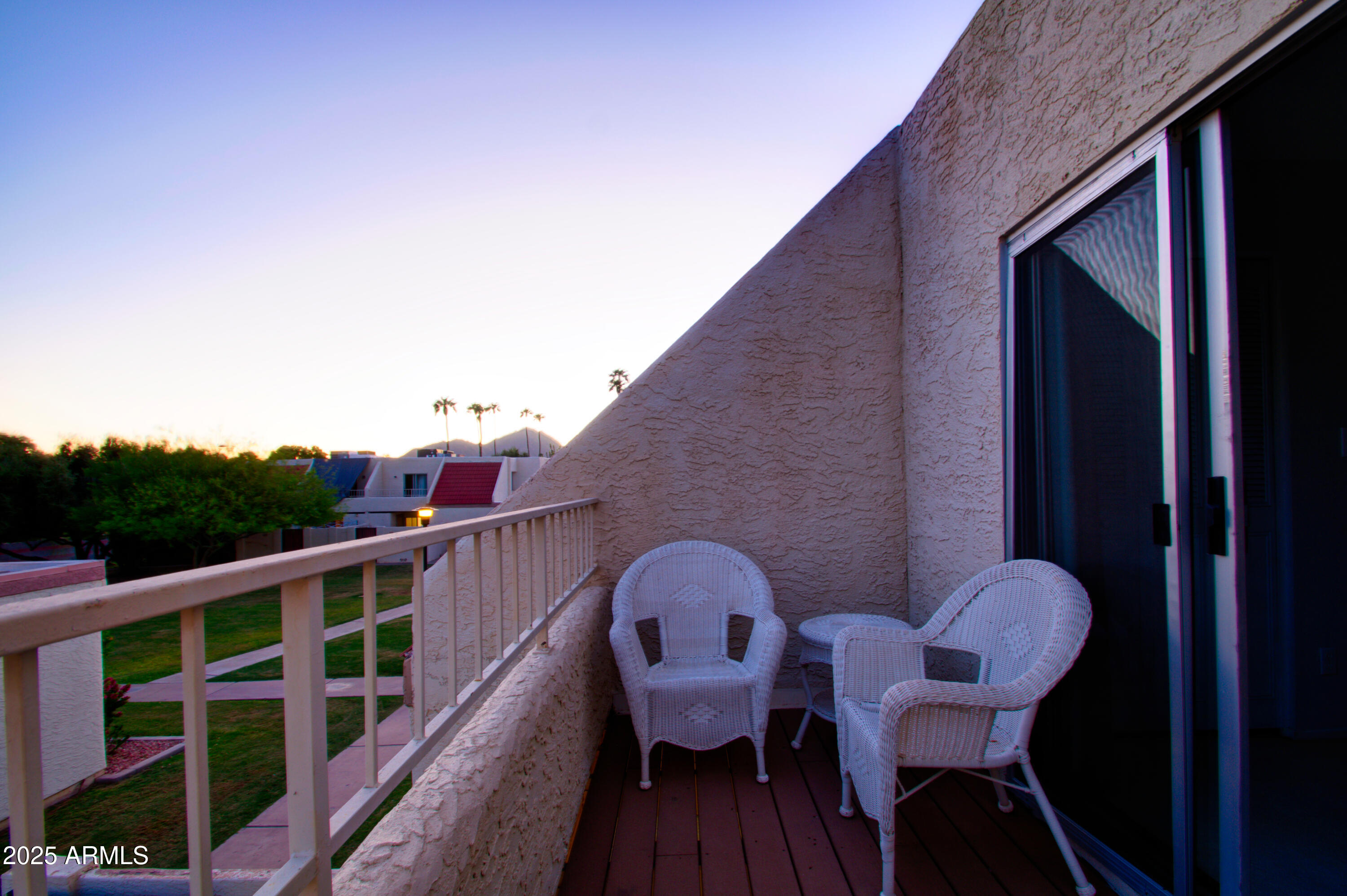 6018 North 79th Street Scottsdale, AZ 85250 - Photo 19 of 24 a view of a balcony with furniture