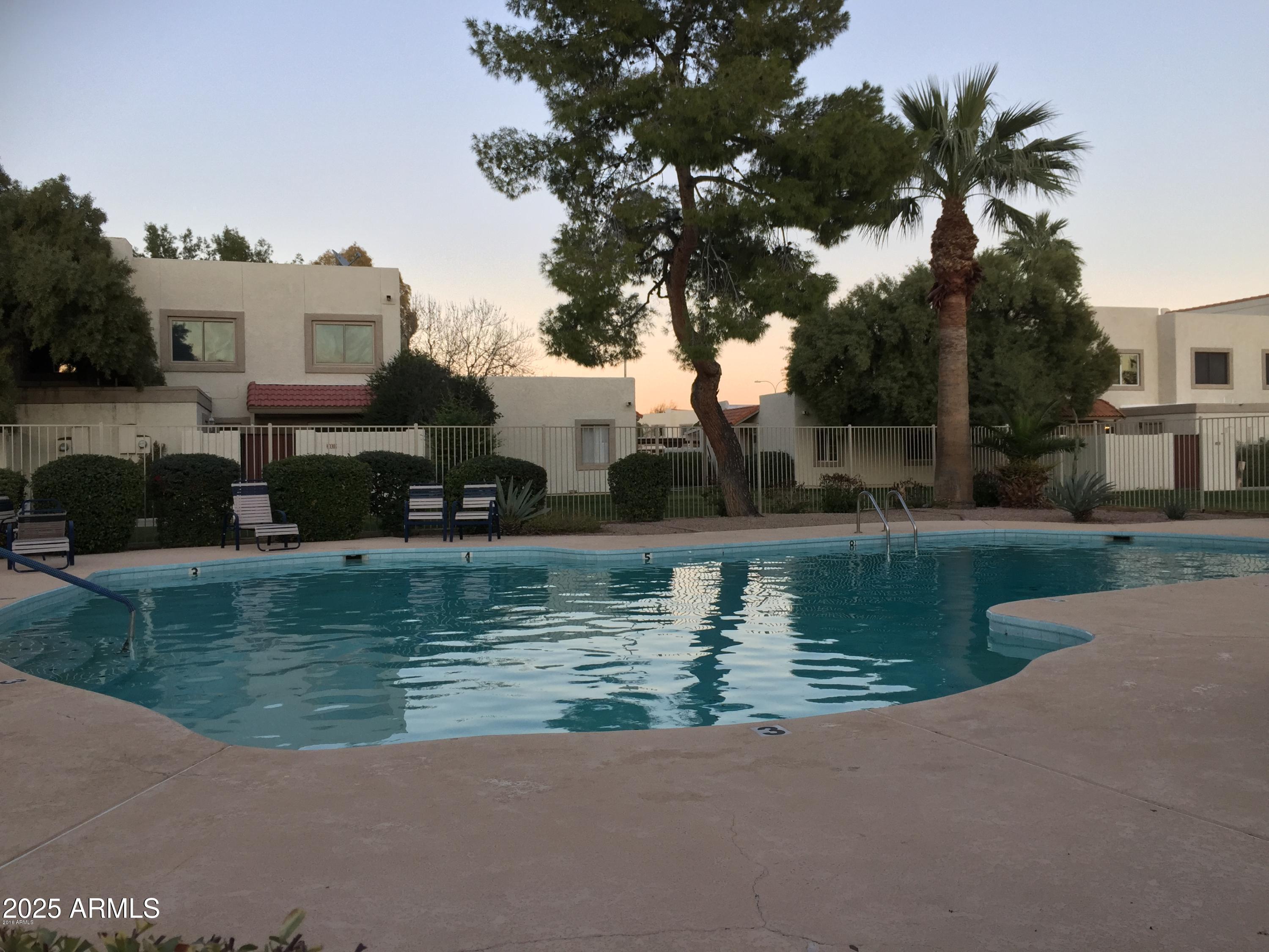 6018 North 79th Street Scottsdale, AZ 85250 - Photo 21 of 24 a view of a house with a yard