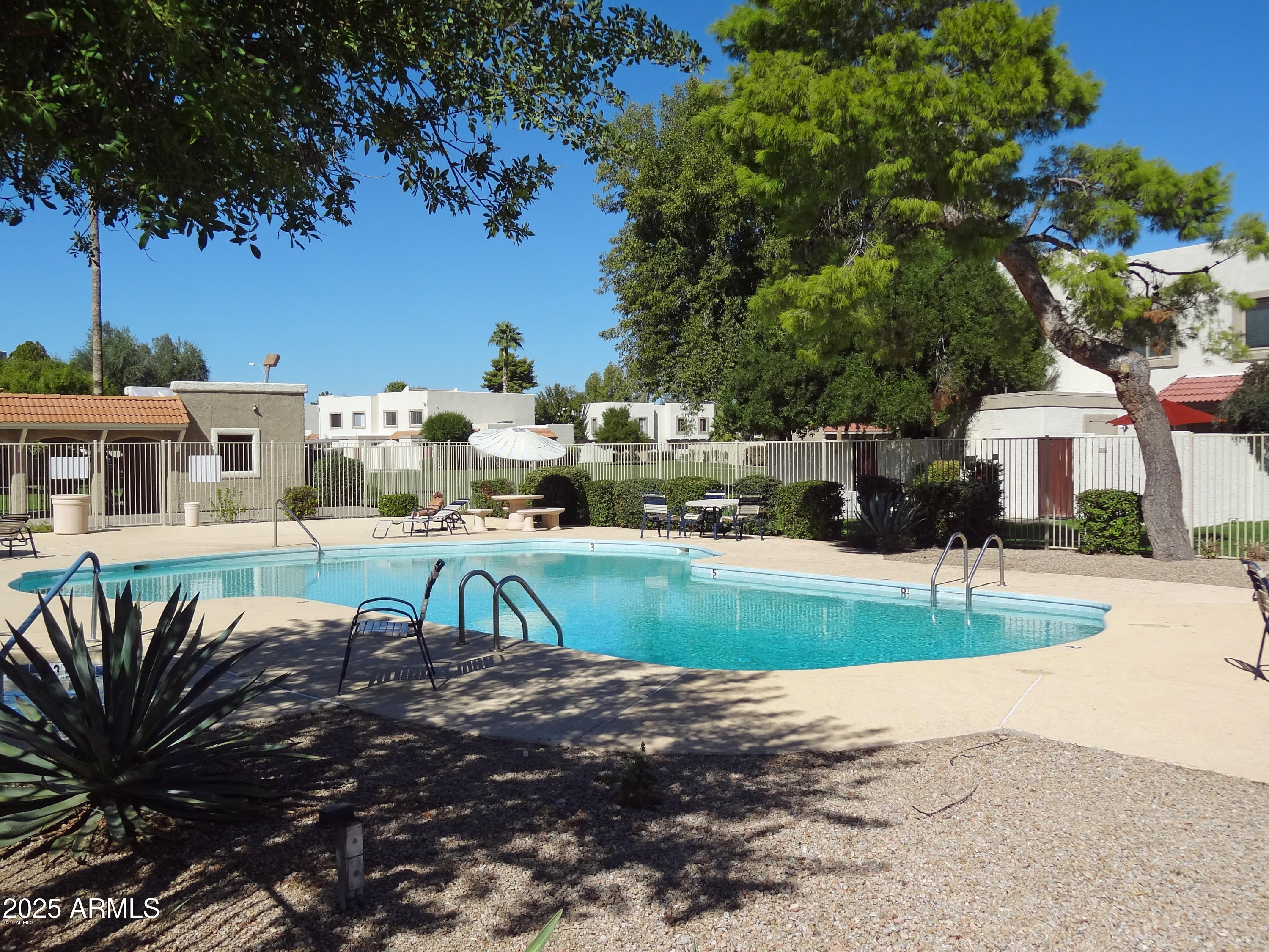 6018 North 79th Street Scottsdale, AZ 85250 - Photo 22 of 24 a view of a house with a yard