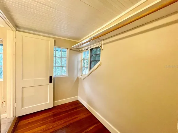 a view of entryway with wooden floor