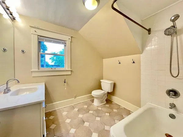 a bathroom with a sink and a tub