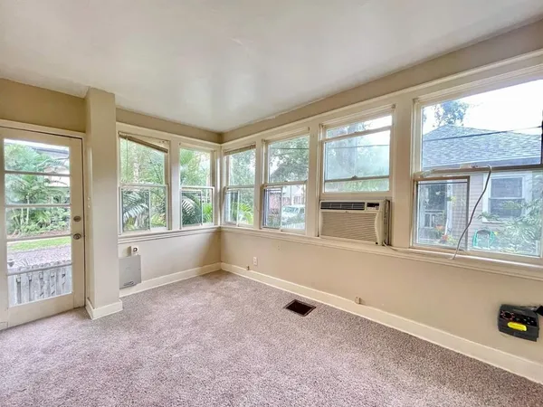 an empty room with windows