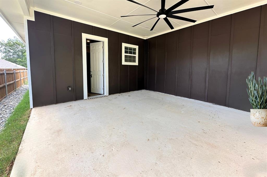 413 Henderson Street Bonham, TX 75418 - Photo 25 of 27 a view of a garage