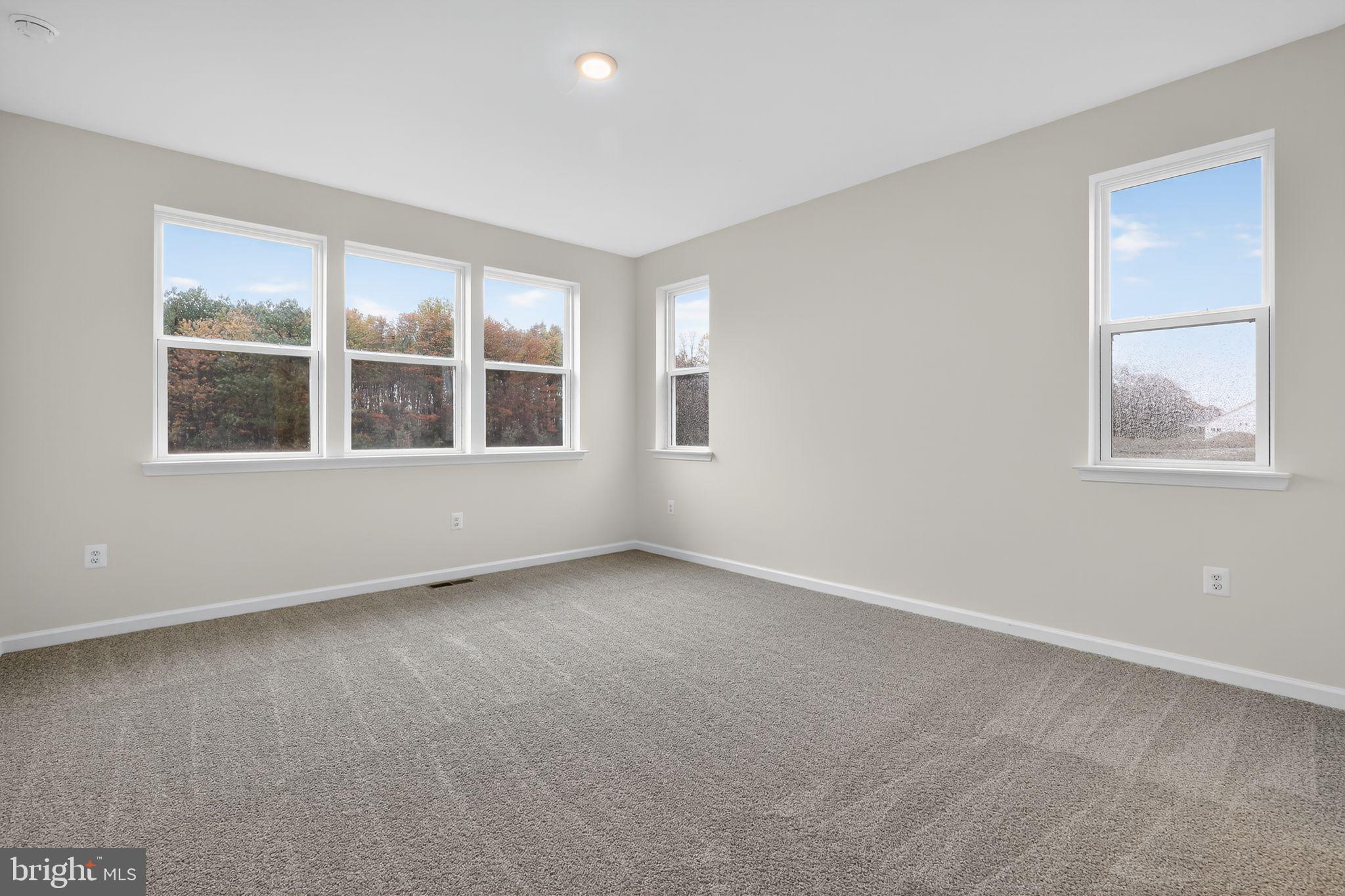 25020 Cypress Court Lewes, DE 19958 - Photo 13 of 21 an empty room with a window