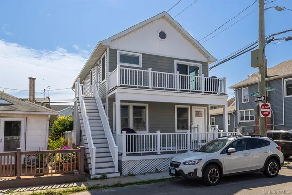 a car parked in front of a house