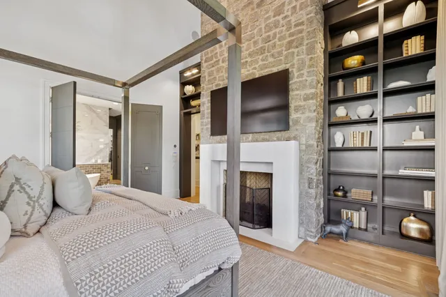 a bathroom with a double vanity sink mirror and