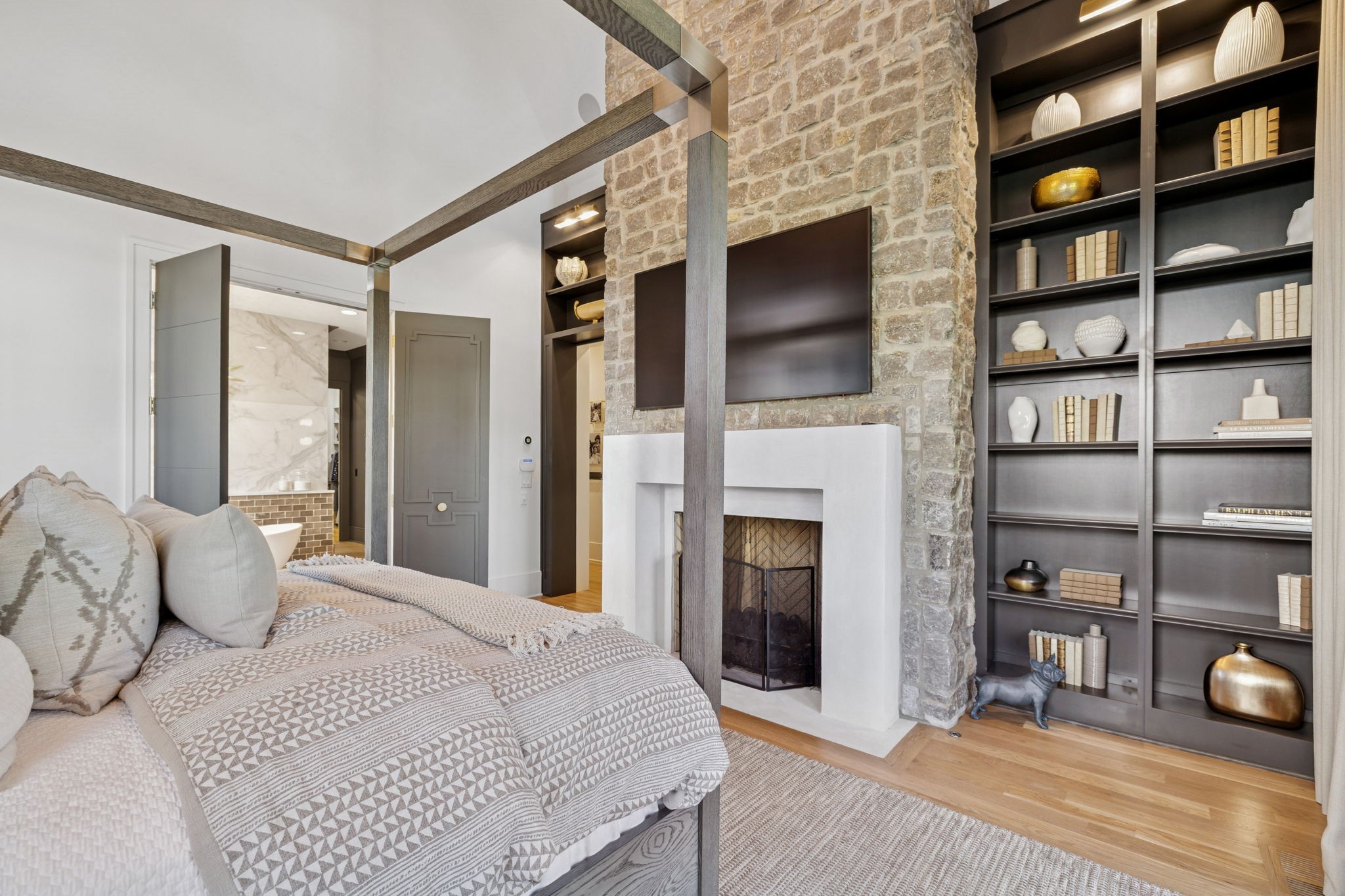 7573 Whiskey Road College Grove, TN 37046 - Photo 29 of 100 a bedroom with a bed a fireplace and a television