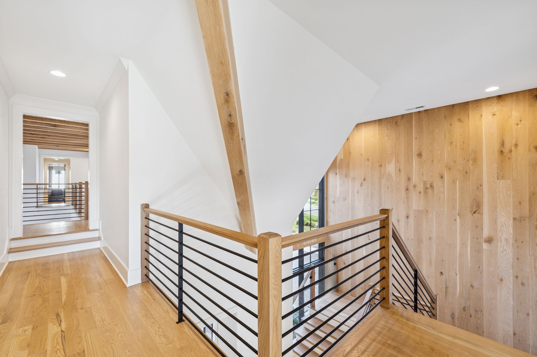 7573 Whiskey Road College Grove, TN 37046 - Photo 46 of 100 a view of a hallway with wooden floor and staircase