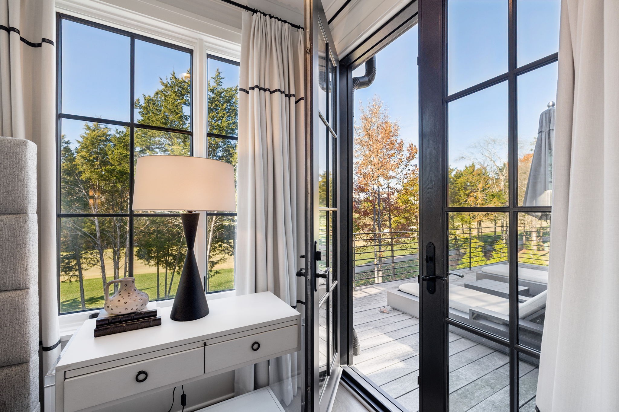 7573 Whiskey Road College Grove, TN 37046 - Photo 55 of 100 a view of living room with a floor to ceiling window and wooden floor