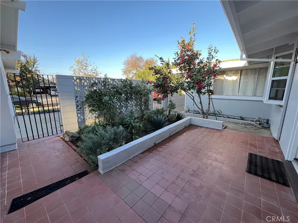 a view of a balcony with an outdoor space
