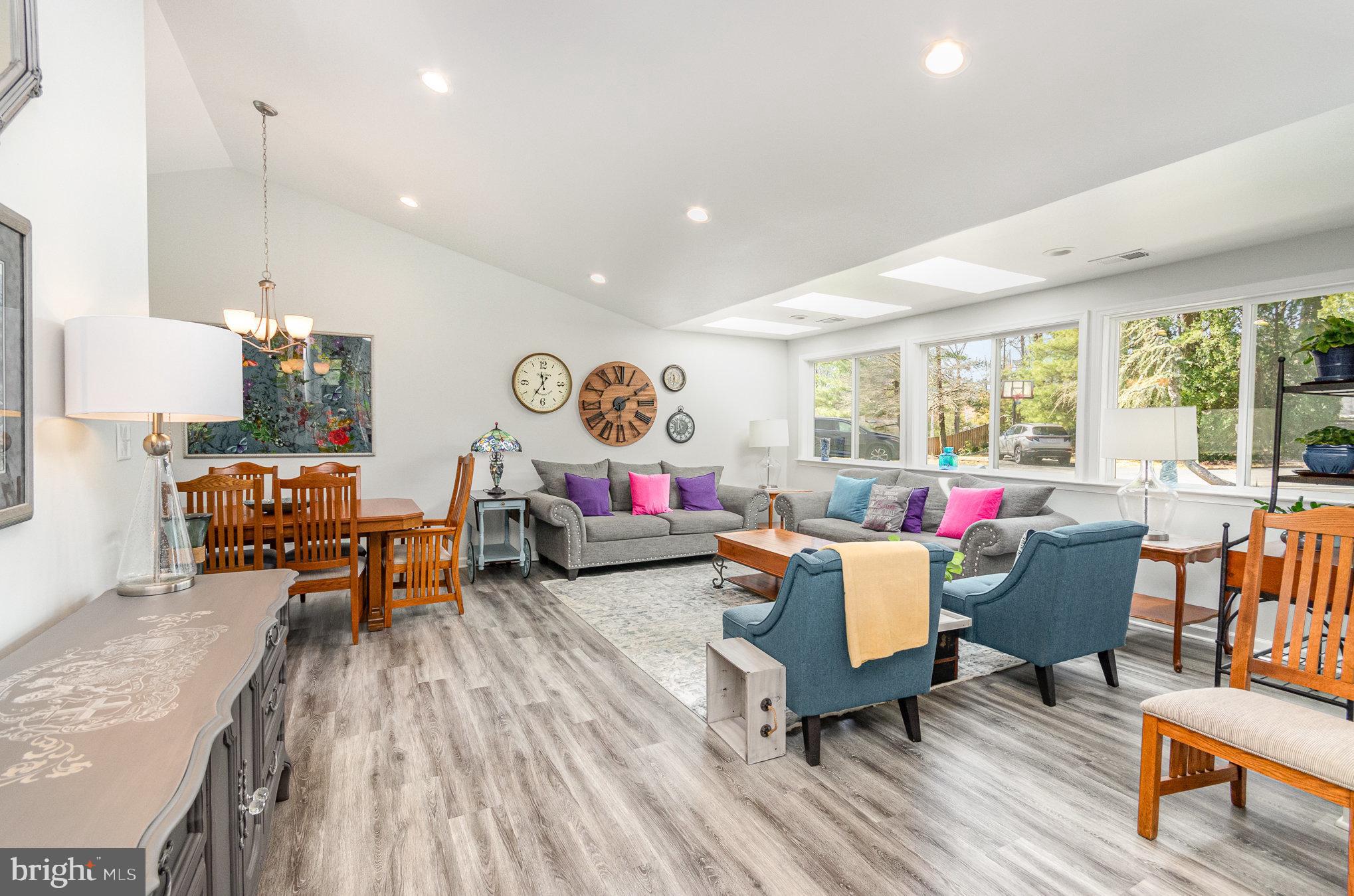 6932 Spelman Drive Springfield, VA 22153 - Photo 3 of 37 a living room with furniture and a wooden floor