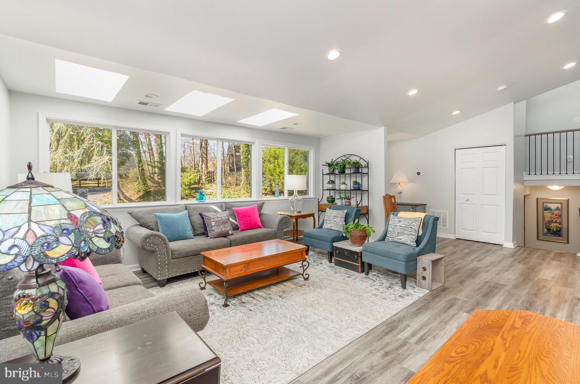 6932 Spelman Drive Springfield, VA 22153 - Photo 8 of 37 a living room with furniture and a large window