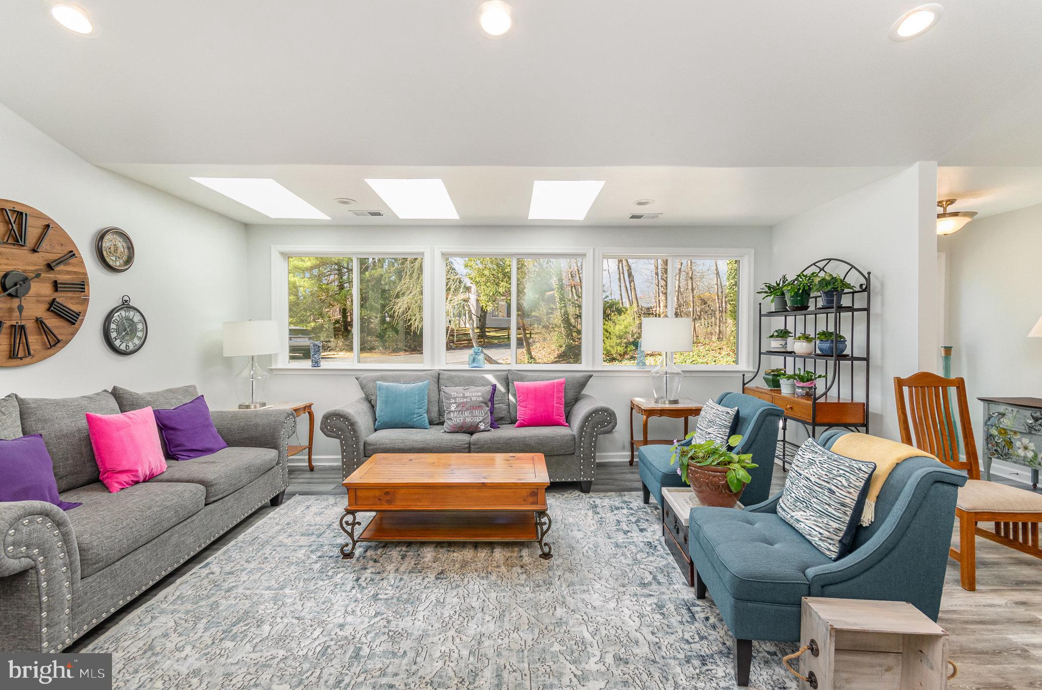 6932 Spelman Drive Springfield, VA 22153 - Photo 9 of 37 a living room with furniture and a large window