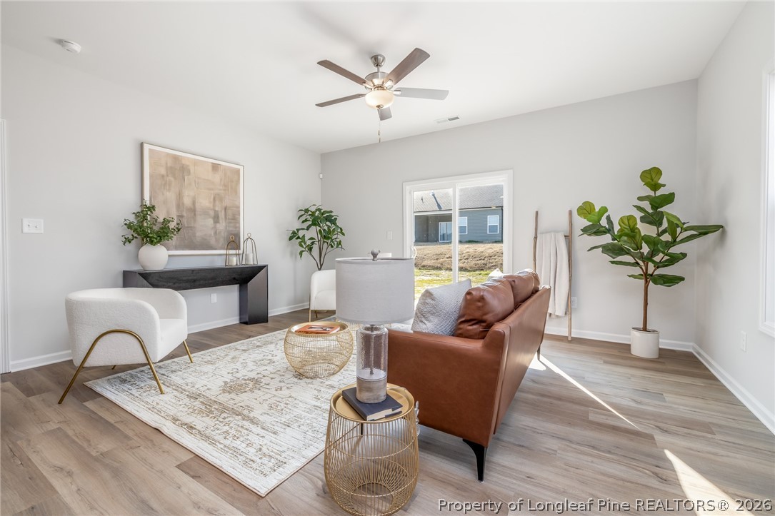5421 Short Leaf (lot 109) Road Raeford, NC 28376 - Photo 20 of 29 a living room with furniture