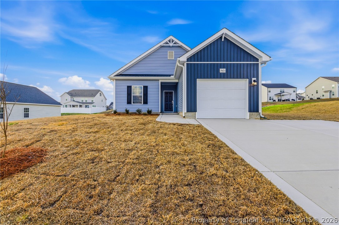 5421 Short Leaf (lot 109) Road Raeford, NC 28376 - Photo 2 of 29 a front view of a house with a yard