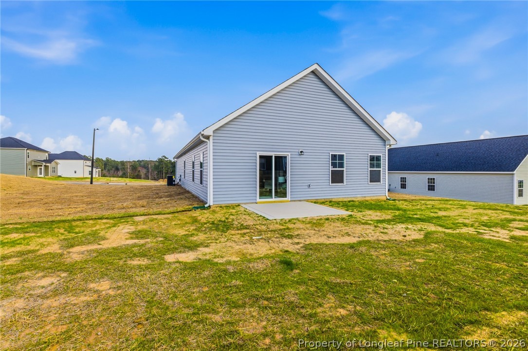 5421 Short Leaf (lot 109) Road Raeford, NC 28376 - Photo 28 of 29 a view of a house with a swimming pool