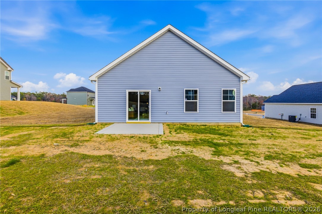 5421 Short Leaf (lot 109) Road Raeford, NC 28376 - Photo 29 of 29 a view of a house with a yard