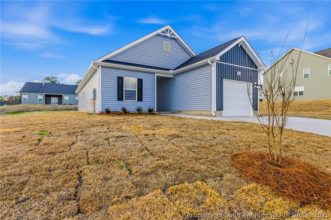 5421 Short Leaf (lot 109) Road Raeford, NC 28376 - Photo 3 of 29 a view of a house with a yard