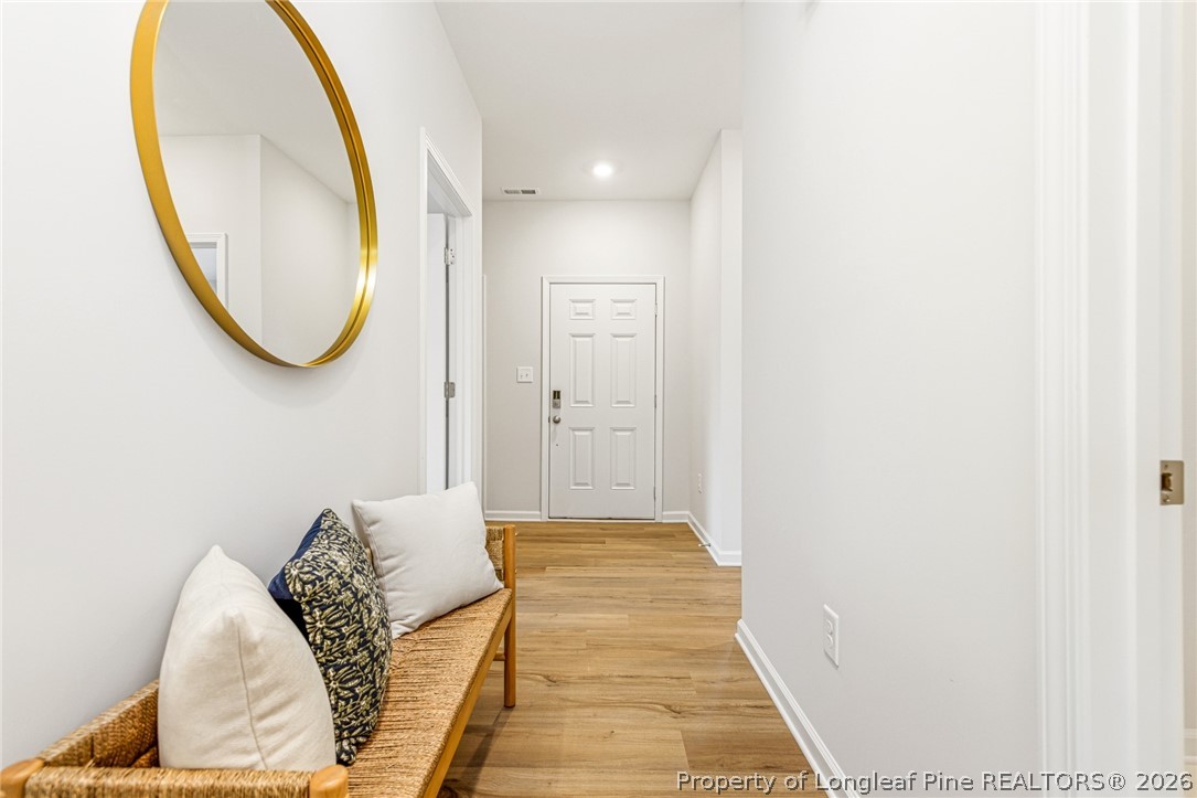 5421 Short Leaf (lot 109) Road Raeford, NC 28376 - Photo 5 of 29 a bedroom with bed and a mirror